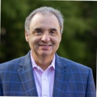 Dwight L.  Jacobs net worth and biography