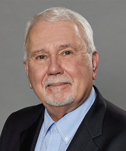 John W.  Kozarich net worth and biography